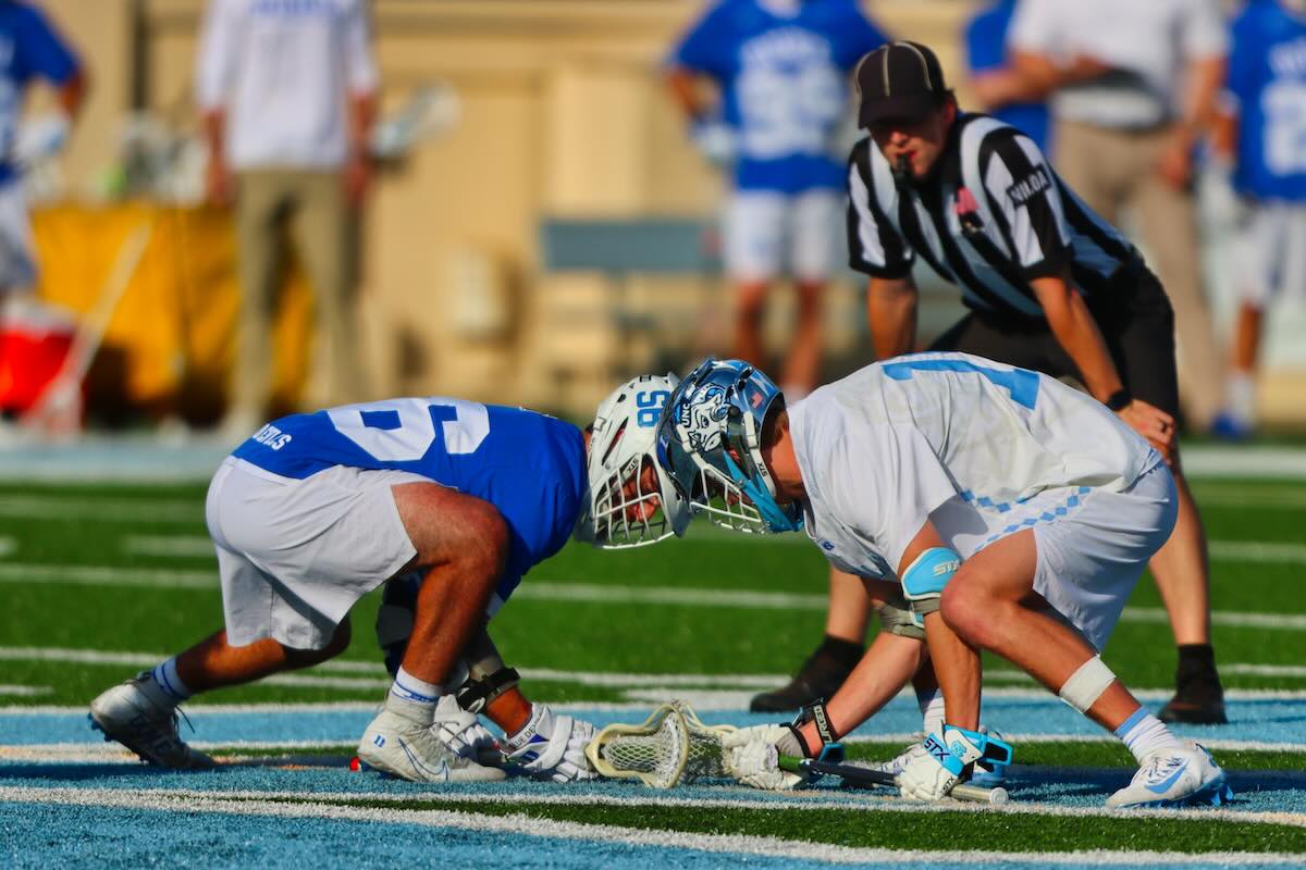 Explore lacrosse scoring with this guide. Learn about goals, assists, and two-point shots in the PLL, and discover variations like indoor and intercrosse.