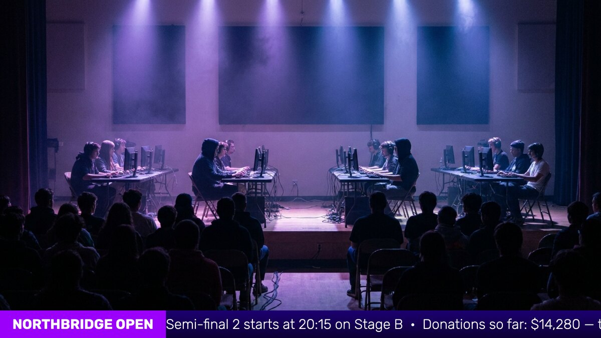 Feature screenshot: Tournament stream with a purple announcement ticker running under the stage