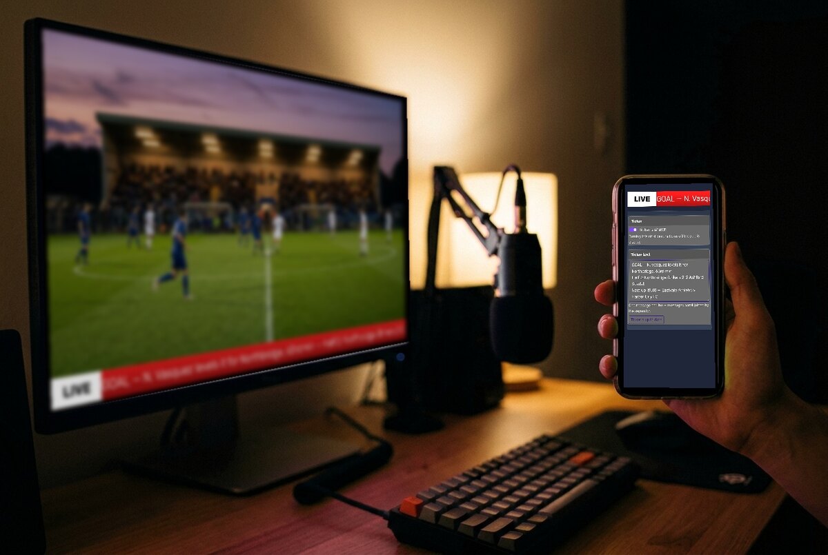 Feature screenshot: The ticker control panel open on a phone while the stream plays on the monitor behind with the ticker running